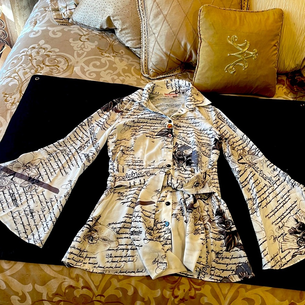 Long flared sleeve blouse with wrap around tie for front or back